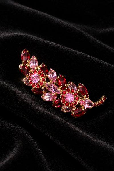 Vintage 1960s Juliana pink and ruby-red rhinestone branch brooch on black velvet