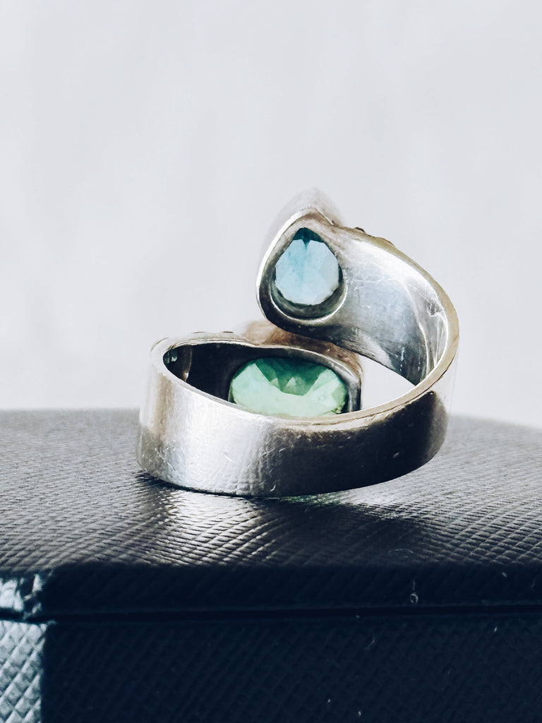 Back view of Sajen bypass ring showing the sterling silver band and detailed craftsmanship