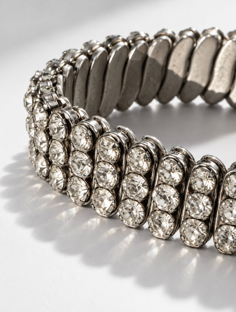 Close-up of vintage rhinestone bracelet showing flexible accordion-style construction