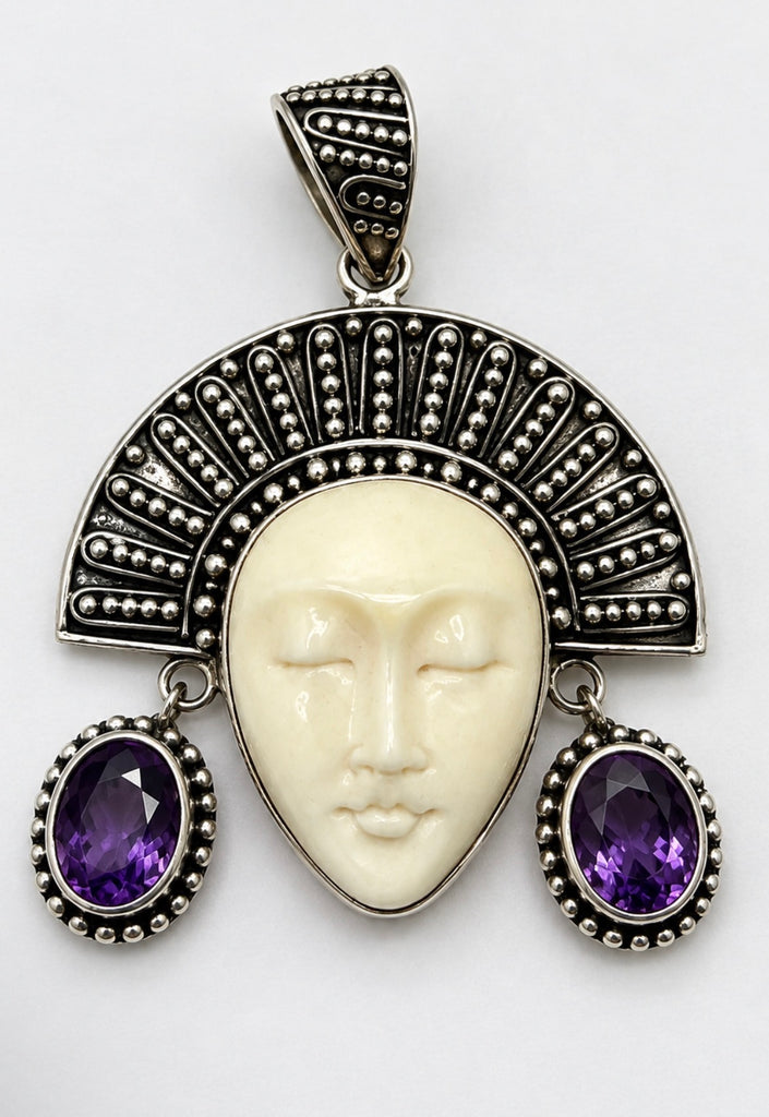 Vintage Balinese goddess 925 sterling silver pendant with carved cream face and two purple oval stones