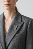 Sterling silver Irish harp brooch styled on jacket lapel