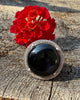 Vintage sterling silver ring with large round black onyx cabochon and double halo of clear stones