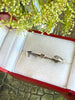 Close-up of vintage silver ring presented in jewellery gift box