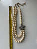 Full view of Heidi Daus Simply Irresistible double strand necklace measuring approximately 9.75 in long