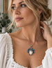 Vintage Balinese Moon Goddess silver pendant worn on necklace showing size and scale