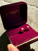 Vintage dark pink faux pearl stud earrings displayed in burgundy jewellery box