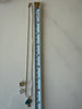 Vintage turquoise necklace shown beside measuring tape for length