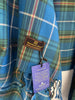 Close-up of Patrick King Nova Scotia tartan scarf with original product tags