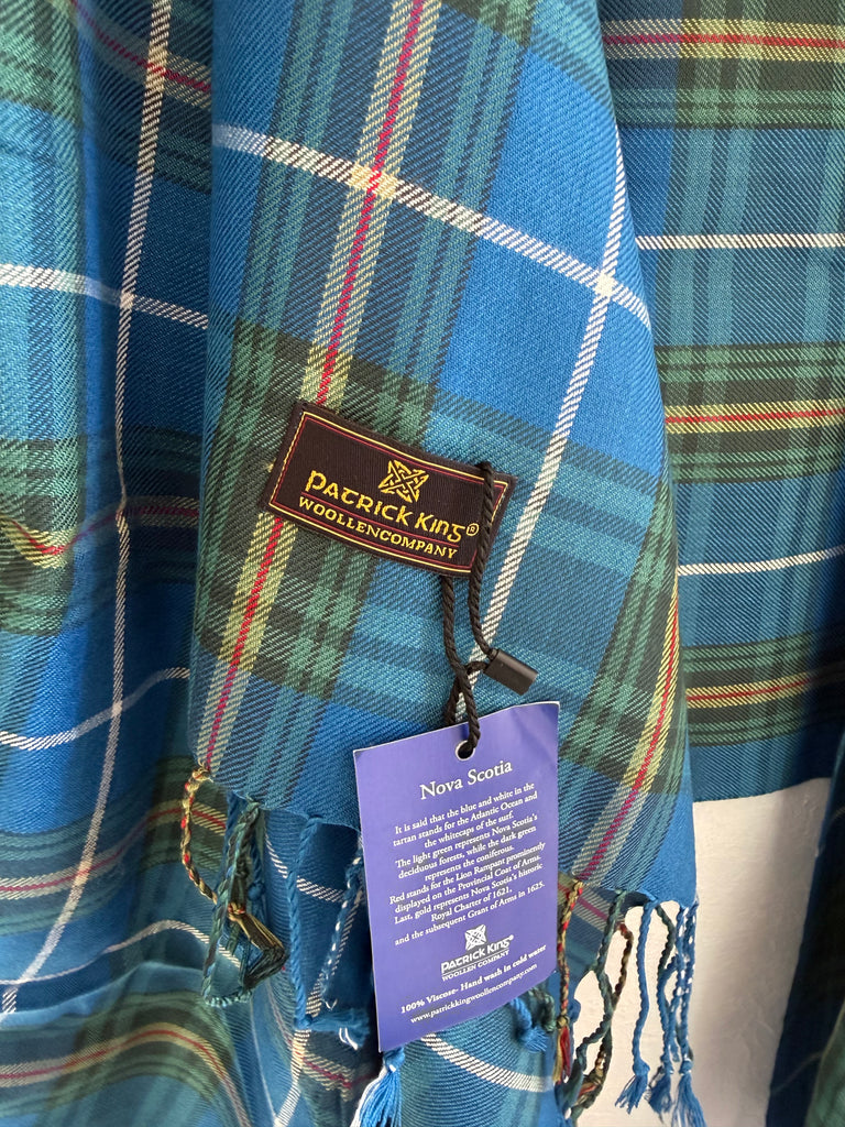 Close-up of Patrick King Nova Scotia tartan scarf with original product tags