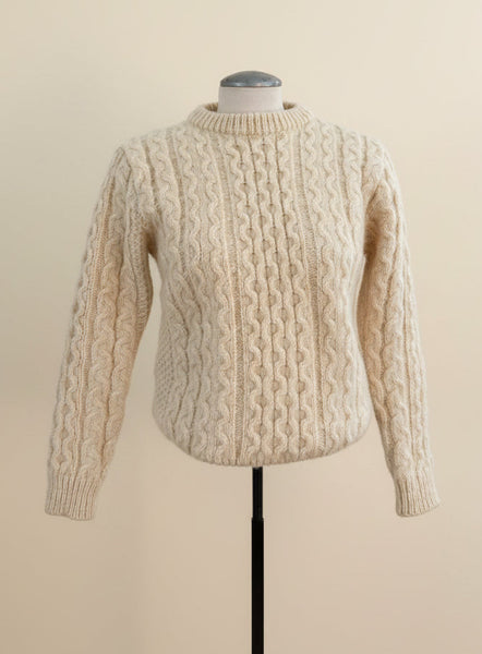Vintage cream Irish wool cable knit pullover sweater made in Ireland displayed on mannequin
