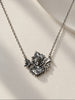 ECCO Art Nouveau-inspired silver pendant hanging from necklace chain