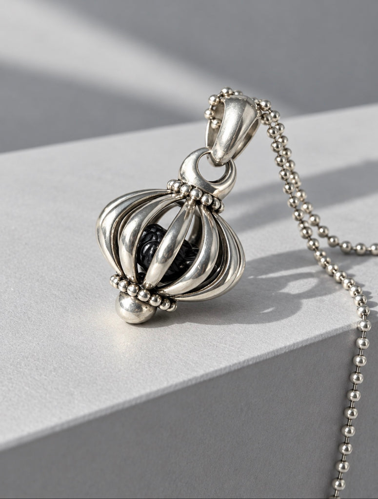 LAGOS Signature Caviar sterling silver birdcage pendant necklace with bird inside