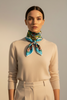 Vintage Banff National Park square scarf styled around the neck with colourful Canadian Rockies print. 