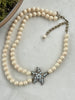 Retired Heidi Daus Simply Irresistible double strand necklace with cream simulated pearls and Swarovski crystal starfish pendant