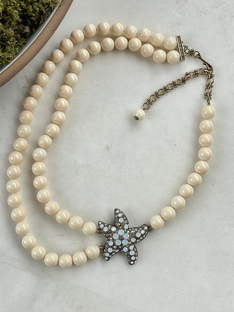 Retired Heidi Daus Simply Irresistible double strand necklace with cream simulated pearls and Swarovski crystal starfish pendant