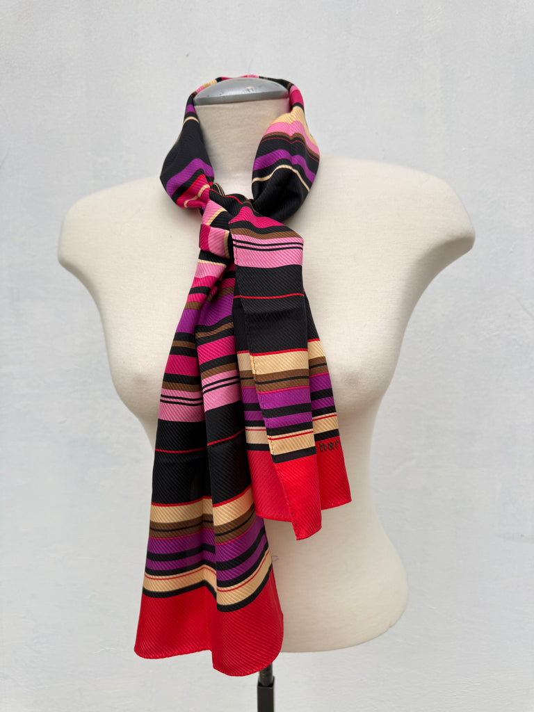 Long vintage Harve Benard silk scarf styled around the neck with bold multicolour stripes.
