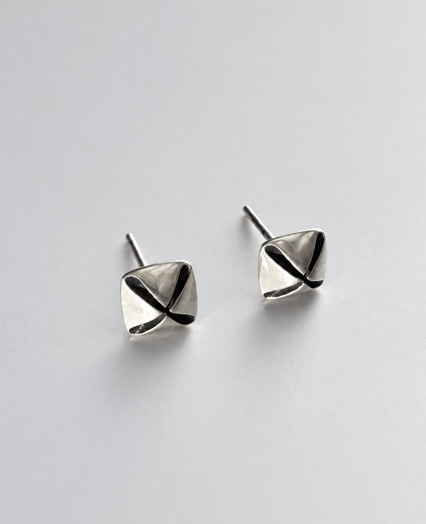 Pair of sculptural geometric silver stud earrings