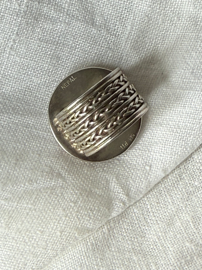 Interior of vintage Nepal coin ring showing 925 sterling silver stamp and Nepal marking