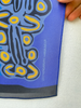 Detail of vintage Lily Nungarrayi Hargraves scarf showing artist signature and printed design. 