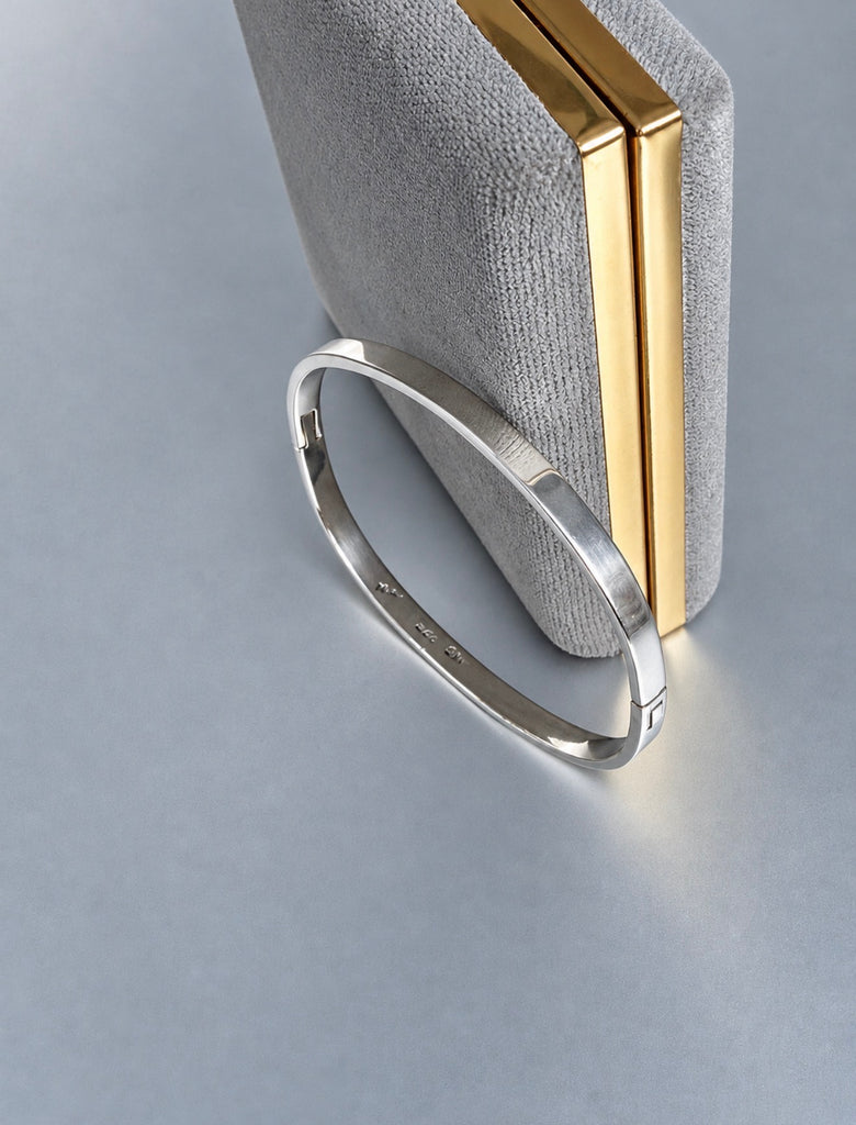 Side view of vintage Mexican sterling silver hinged bangle