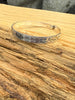 Vintage silver bracelet showing engraved cross-hatching and split-U details