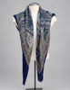 Vintage blue and teal paisley shawl displayed over white mannequin