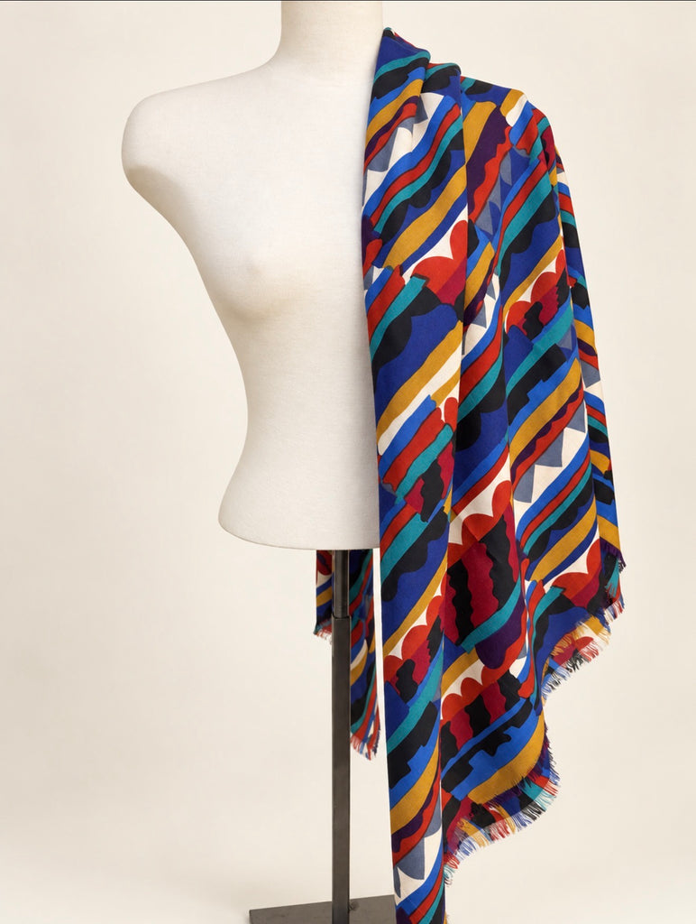Large Liberty of London Bauhaus wool scarf displayed on mannequin