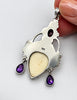 Back of vintage Balinese goddess 925 silver pendant showing silver setting and pendant bail