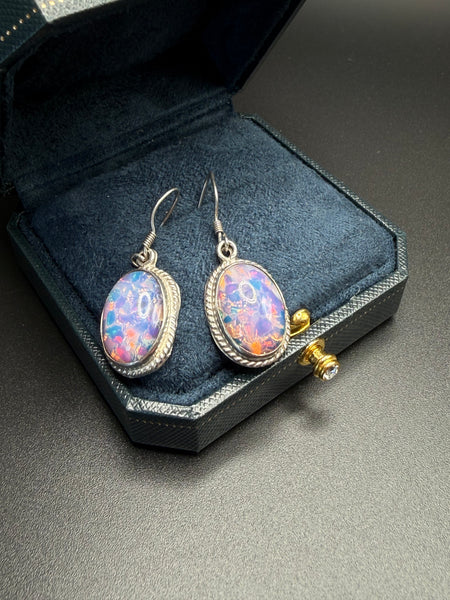Vintage sterling silver dragon’s breath glass drop earrings with pink purple iridescent oval cabochons