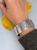 Antique Edwardian sterling silver bangle bracelet worn on wrist