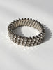 Vintage silver-tone rhinestone bracelet displayed in circular shape