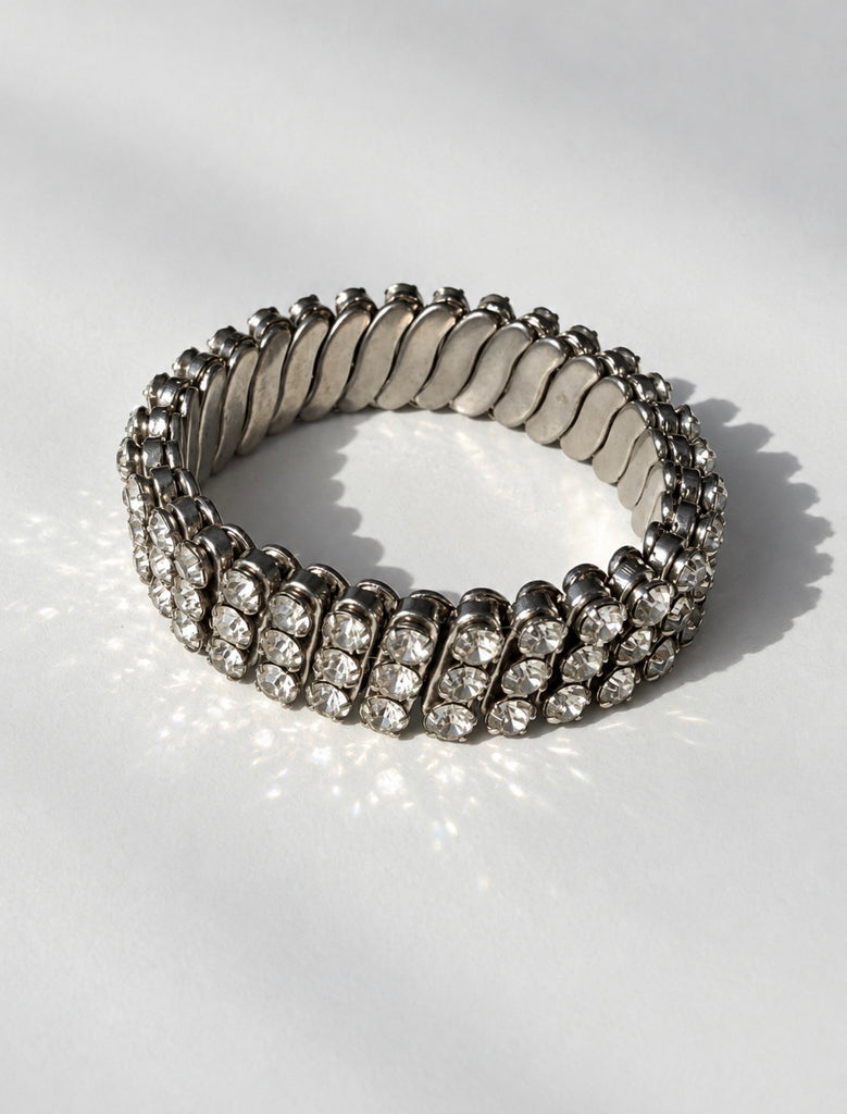 Vintage silver-tone rhinestone bracelet displayed in circular shape