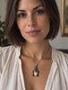Balinese goddess sterling silver pendant worn on necklace showing size and statement design