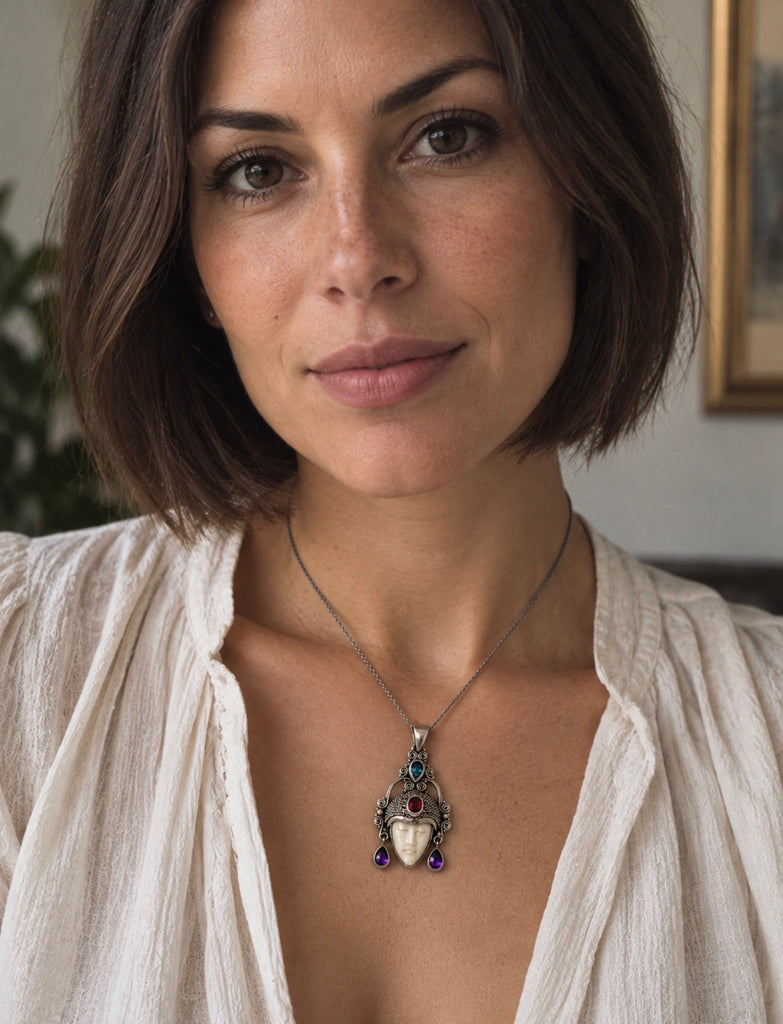 Balinese goddess sterling silver pendant worn on necklace showing size and statement design