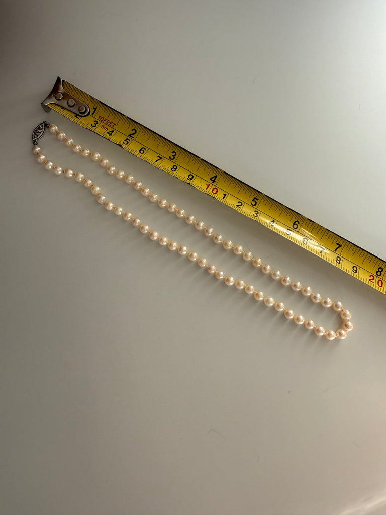 Close-up of vintage freshwater pearl necklace measuring approximately 8 inches long