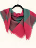Hand-woven Scottish wool plaid scarf styled as a triangular neck scarf