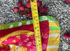 Vintage cat print silk scarf shown with measuring tape across the fabric. 