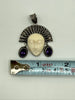 Vintage Balinese goddess sterling silver pendant beside measuring tape showing approximately 1.8 inch width