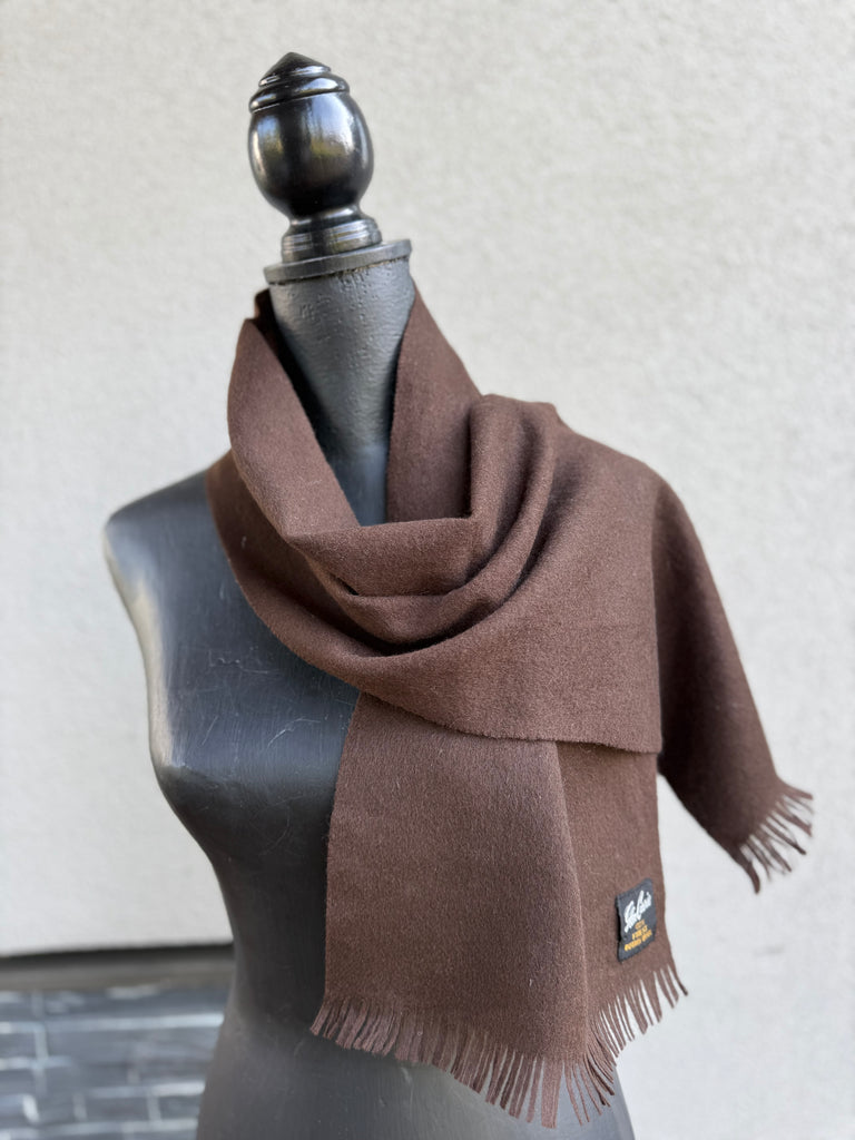 Vintage chocolate brown wool scarf styled around the neck on mannequin. 
