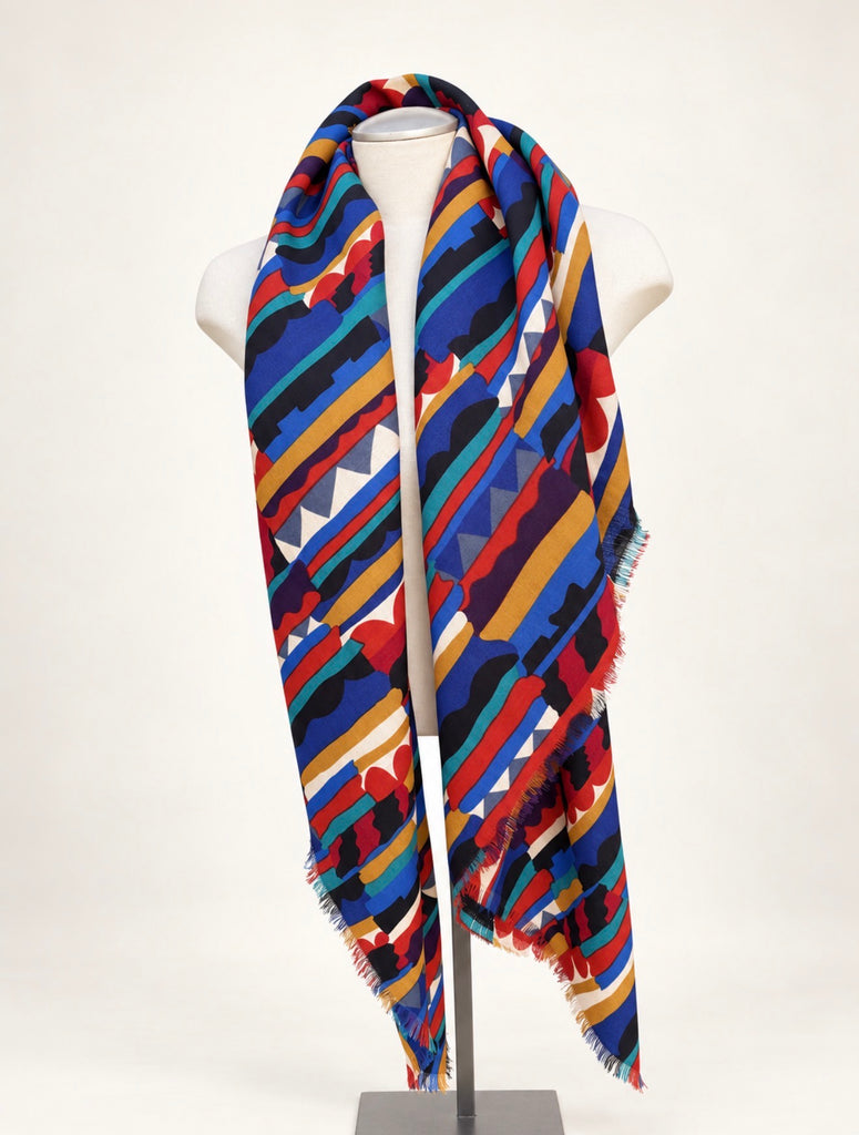 Large Liberty of London geometric wool scarf draped vertically