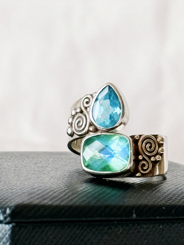 Vintage Sajen sterling silver bypass ring with blue topaz and Caribbean Sea quartz 