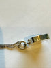 Close-up of Kultaseppä Salovaara necklace connector stamped FINLAND