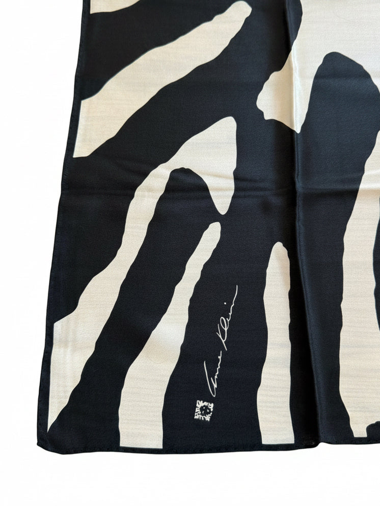 Close-up of Anne Klein signature incorporated into vintage silk scarf print. 