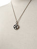 Vintage Kultaseppä Salovaara sculptural pendant necklace displayed on white background