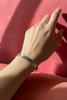 Vintage Eagle and Raven silver bracelet worn on wrist