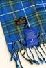 Close-up of Patrick King Nova Scotia tartan scarf with original product tags