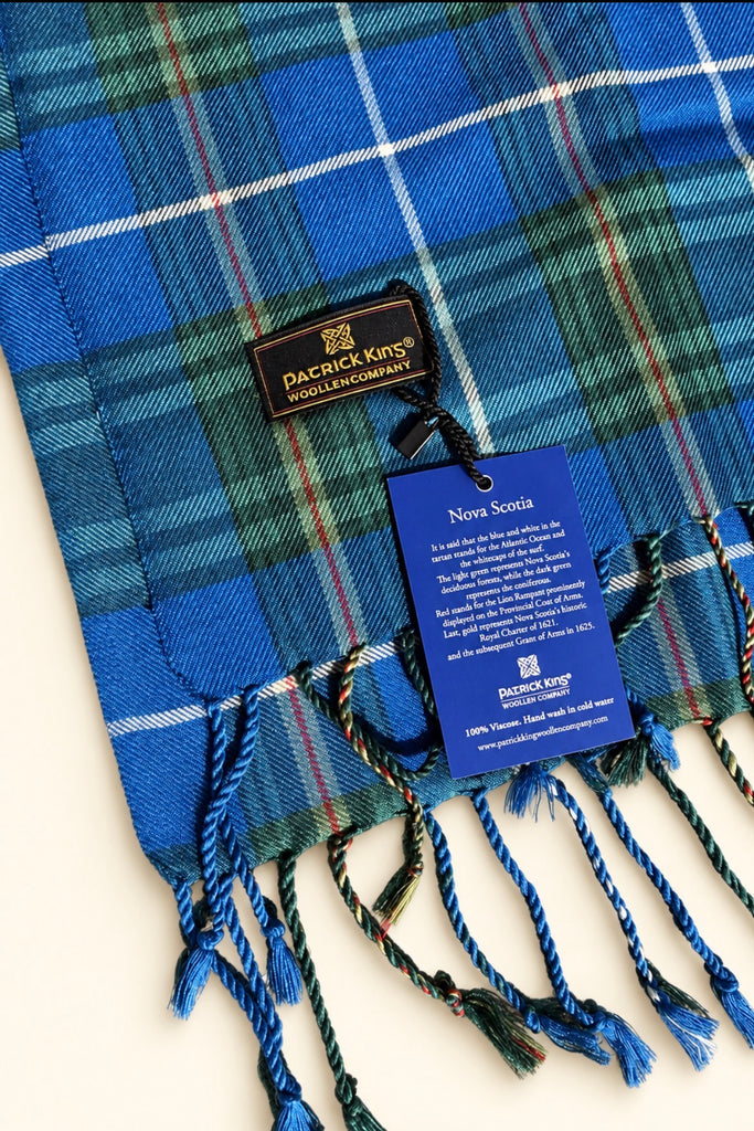 Close-up of Patrick King Nova Scotia tartan scarf with original product tags