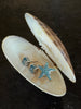 Swarovski Eternity starfish crystal pin and blue stud earrings displayed together