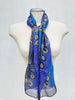 Blue Lily Nungarrayi Hargraves art scarf styled long around the neck on mannequin. 