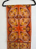 Vintage orange silk scarf with ornate brown gold and cream paisley floral print. 